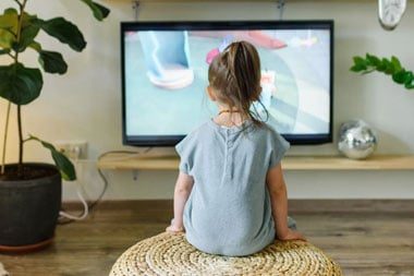 Girl Watching TV At Home — Coughran Electrical Electrician services in Northern Rivers Byron, NSW
